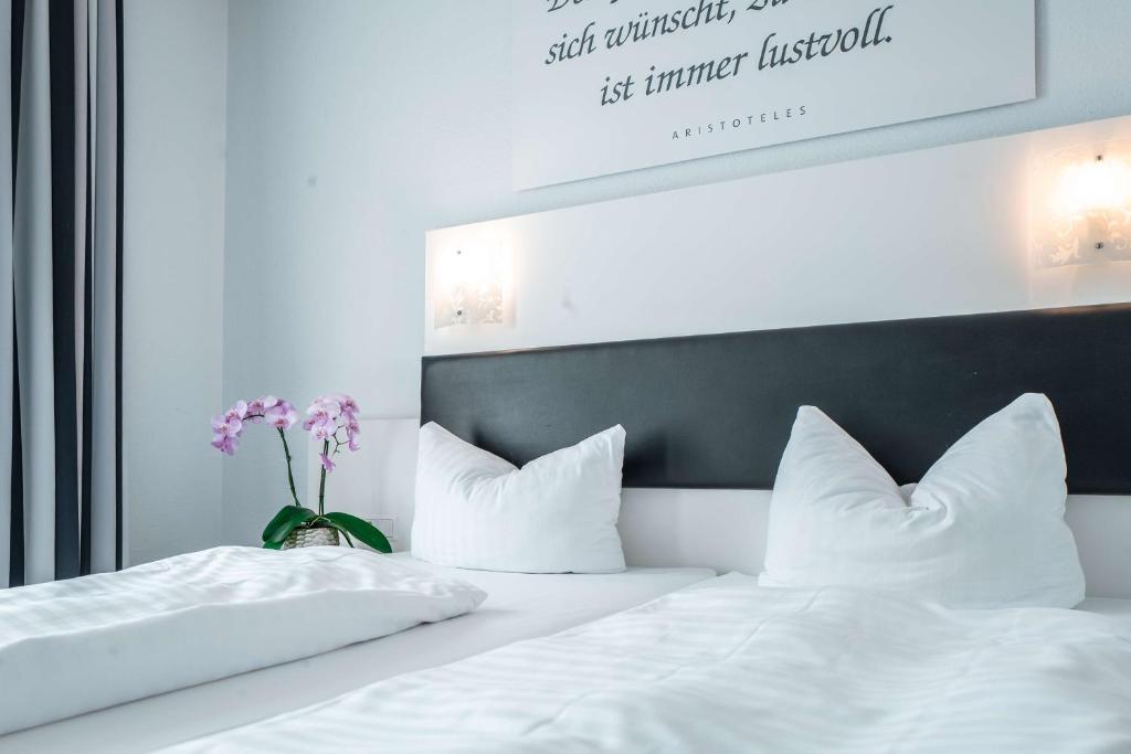 Postel nebo postele na pokoji v ubytování Sure Hotel by Best Western Bad Dürrheim