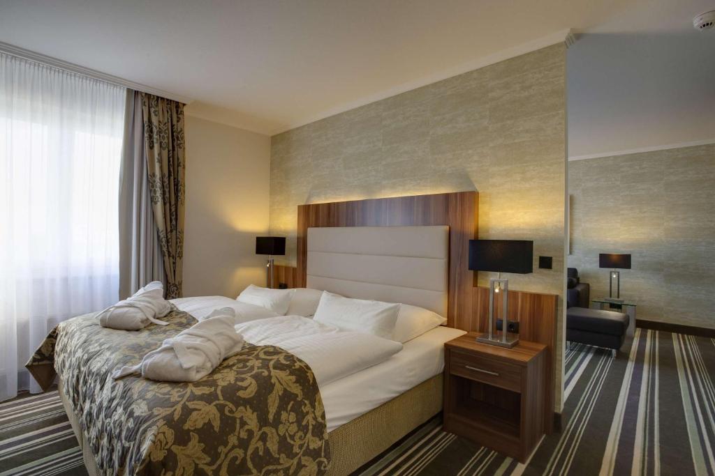 Postel nebo postele na pokoji v ubytování Best Western Plus Hotel Böttcherhof