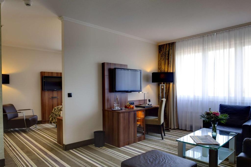 TV a/nebo společenská místnost v ubytování Best Western Plus Hotel Böttcherhof