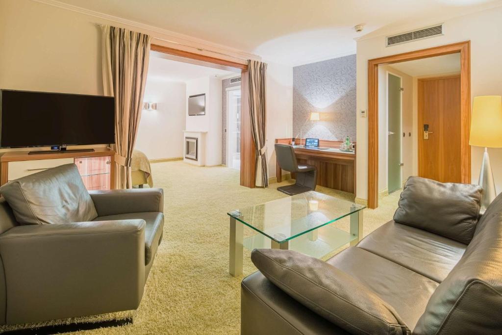 TV a/nebo společenská místnost v ubytování Best Western Plus Hotel Böttcherhof