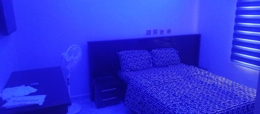Una cama o camas en una habitación de Blusporting hotel & suite