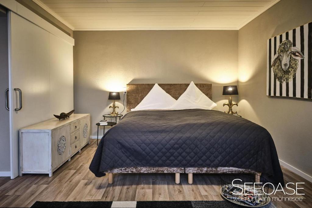 Postel nebo postele na pokoji v ubytování Seeoase - Wohnung Am Möhnesee