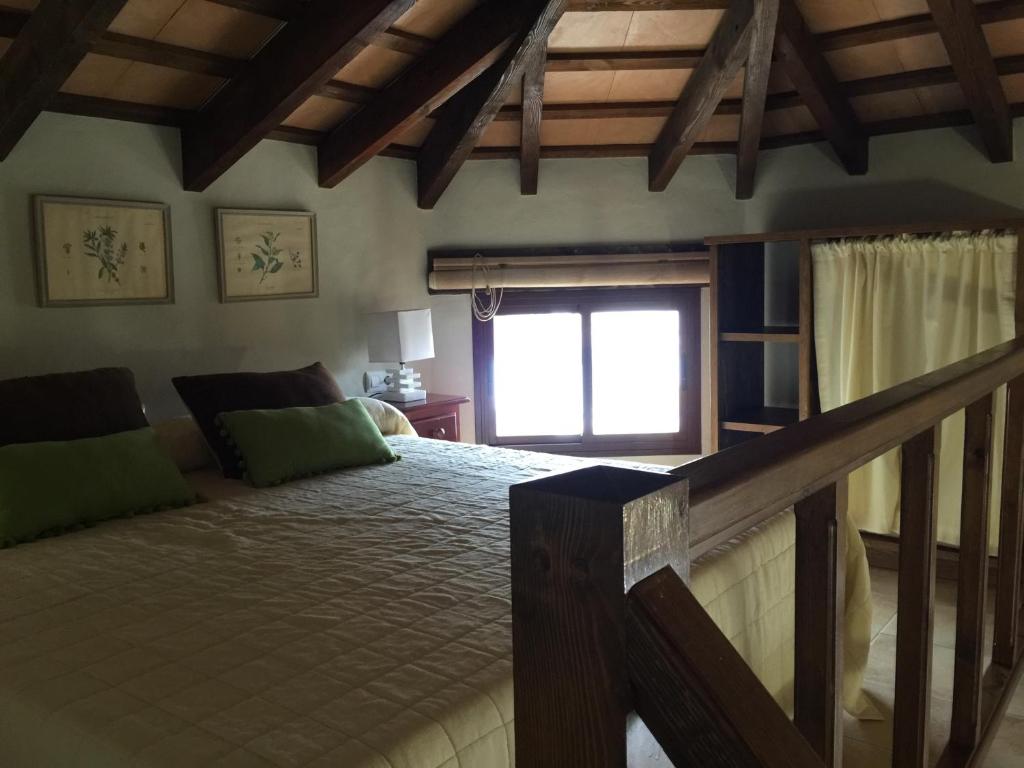 Postel nebo postele na pokoji v ubytování Casa Rural Aldea Chica