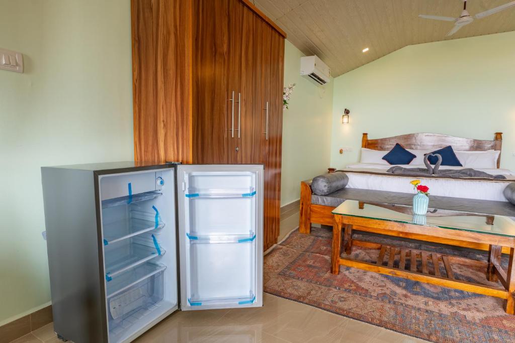 Postel nebo postele na pokoji v ubytování Goa Beach Villa