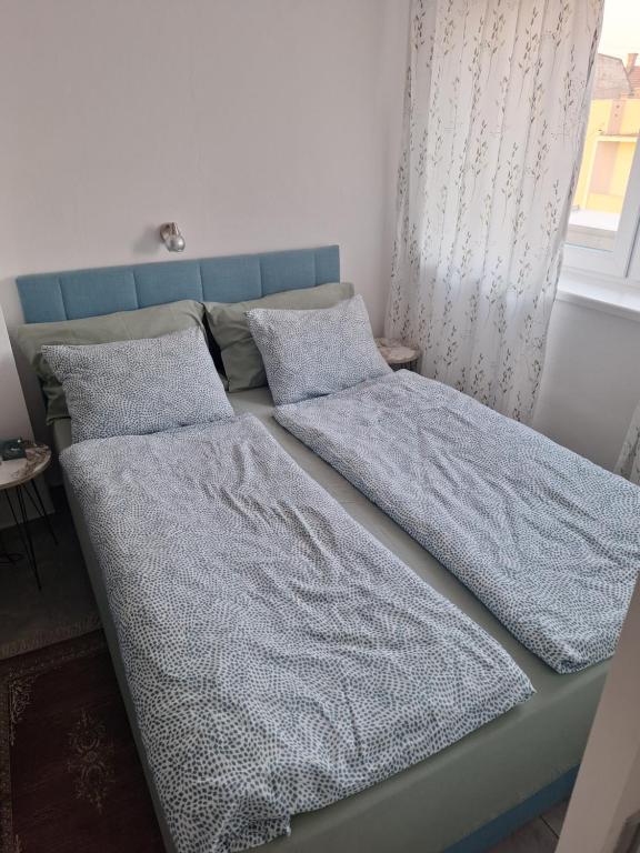 Postel nebo postele na pokoji v ubytování Apartman u Zemunu