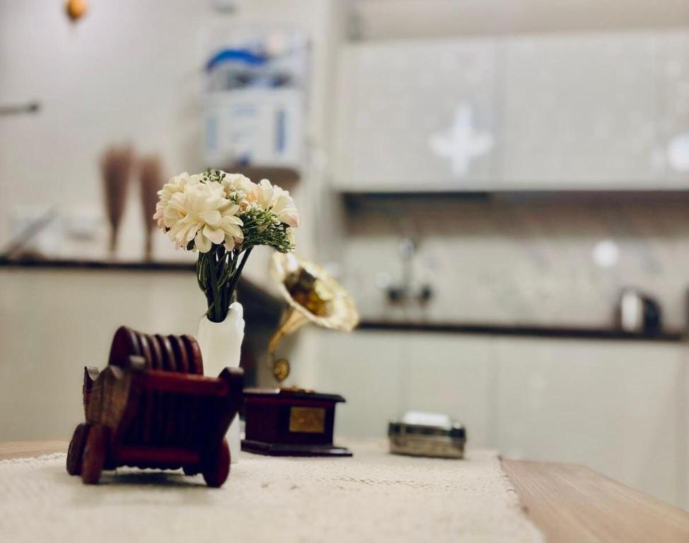 Enchanted- Luxury Studio Apartmentにあるキッチンまたは簡易キッチン