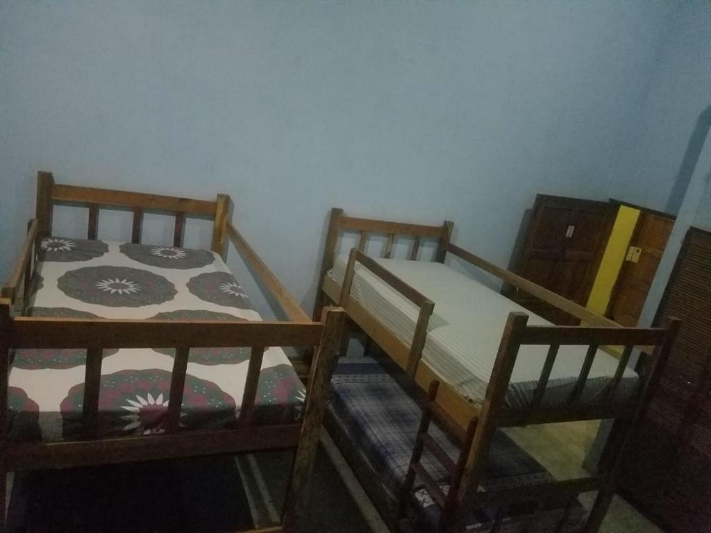 Postel nebo postele na pokoji v ubytování Hostal Juan Lindo