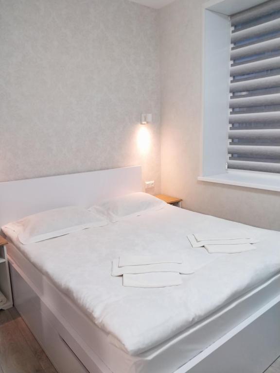 Postel nebo postele na pokoji v ubytování Hotel Avatar