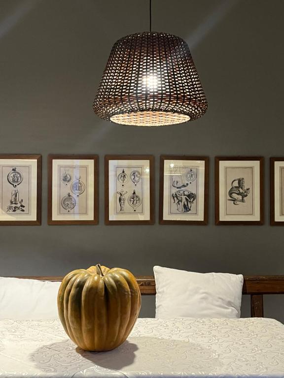 Rúm í herbergi á Albergo Commercio - Ristorante Mas-cì