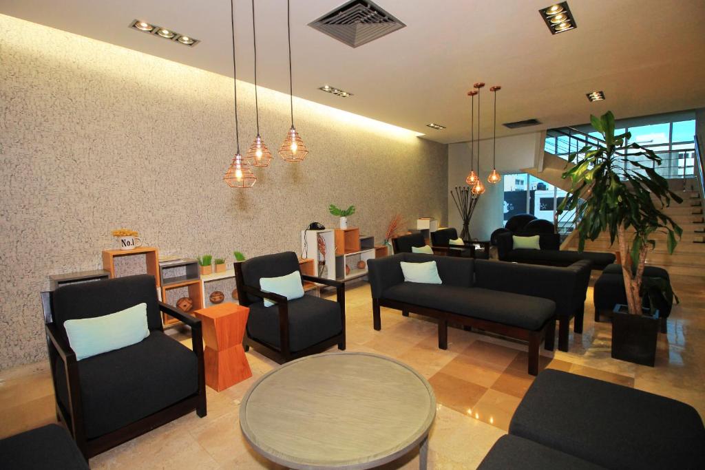 Posezení v ubytování Rivoli Select Hotel