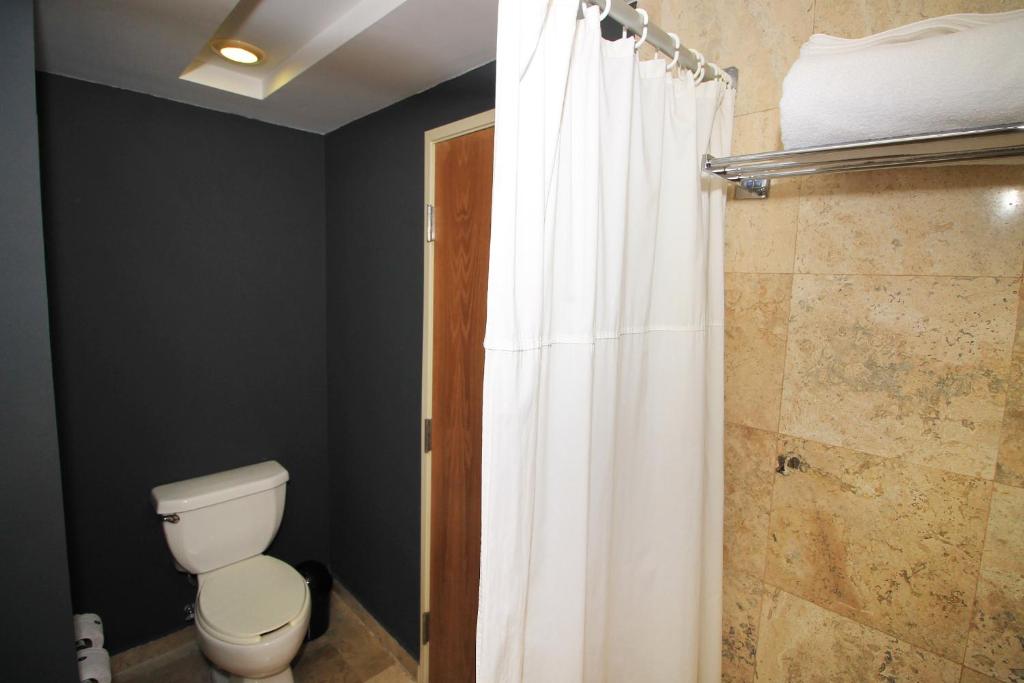 Koupelna v ubytování Rivoli Select Hotel