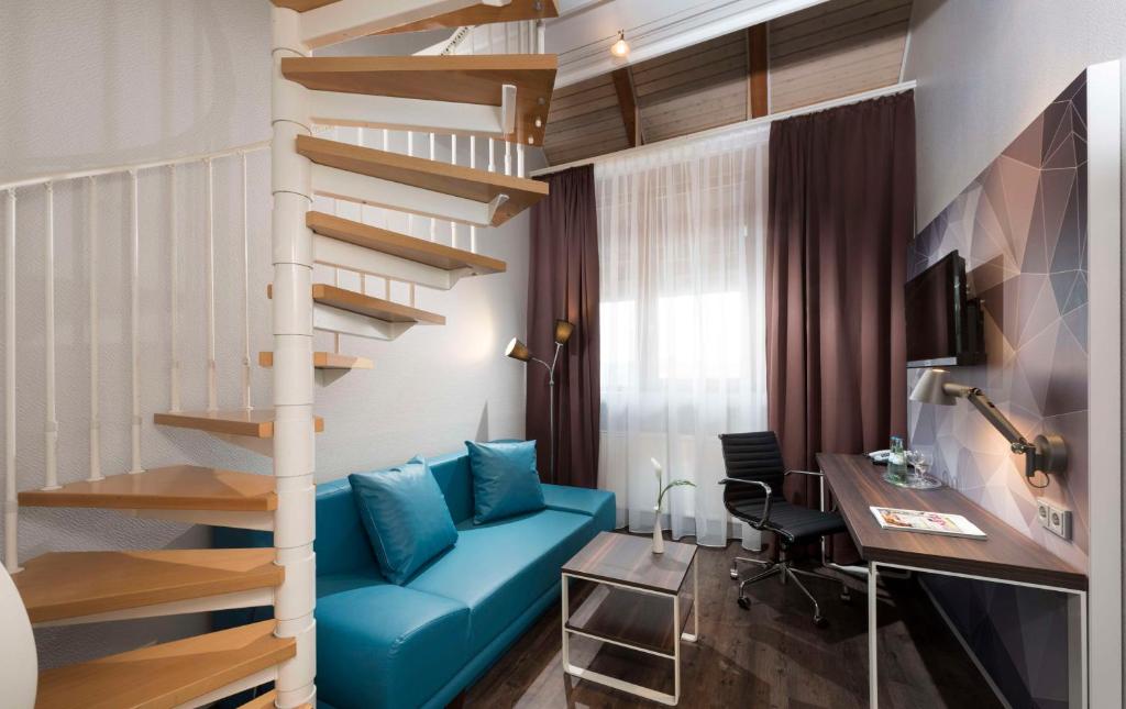 TV a/nebo společenská místnost v ubytování Best Western Hotel Braunschweig Seminarius