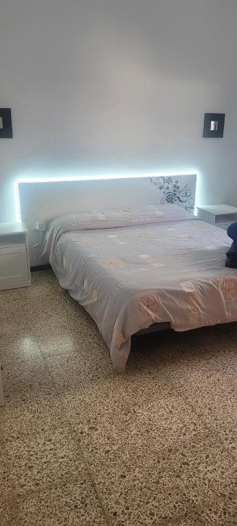 Posteľ alebo postele v izbe v ubytovaní Casa Punta del Sol Vista Al Atlántico
