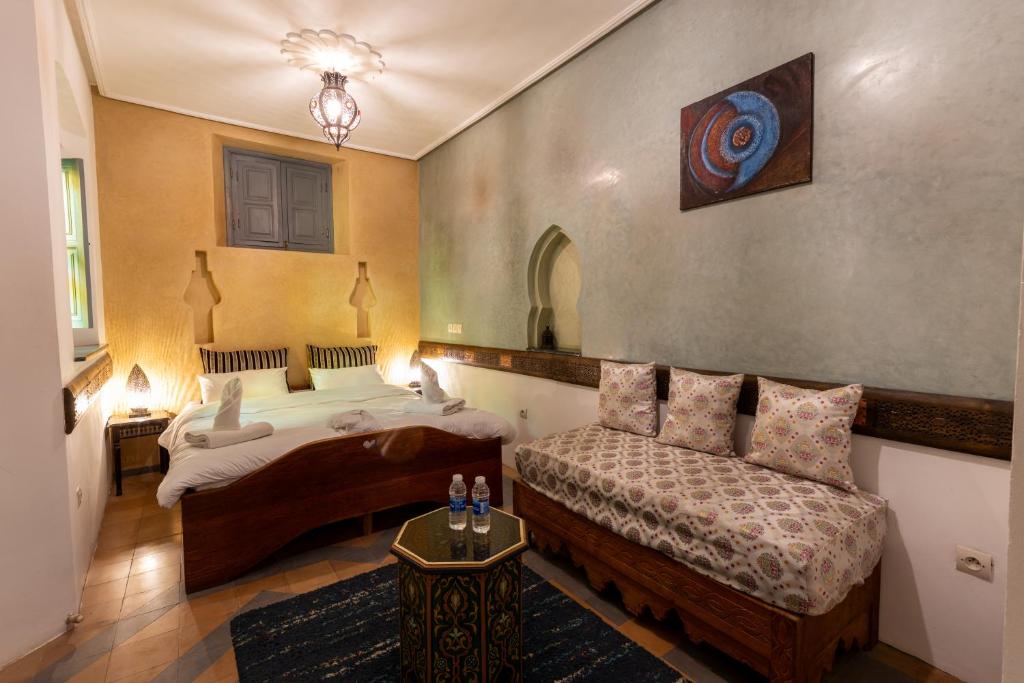 Postel nebo postele na pokoji v ubytování Riad Aicha Marrakech