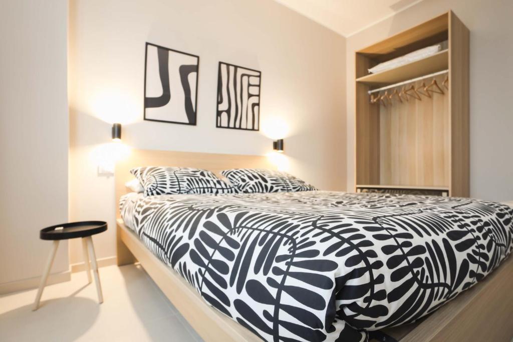 Postel nebo postele na pokoji v ubytování B&B Il Rifugio Urbano
