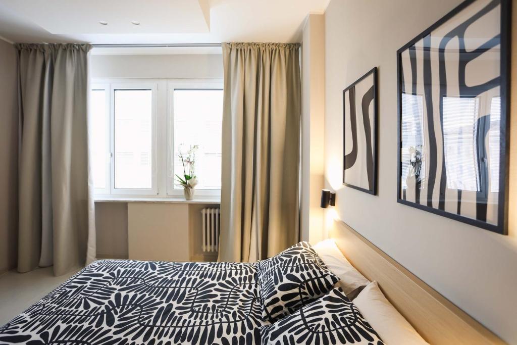 Postel nebo postele na pokoji v ubytování B&B Il Rifugio Urbano
