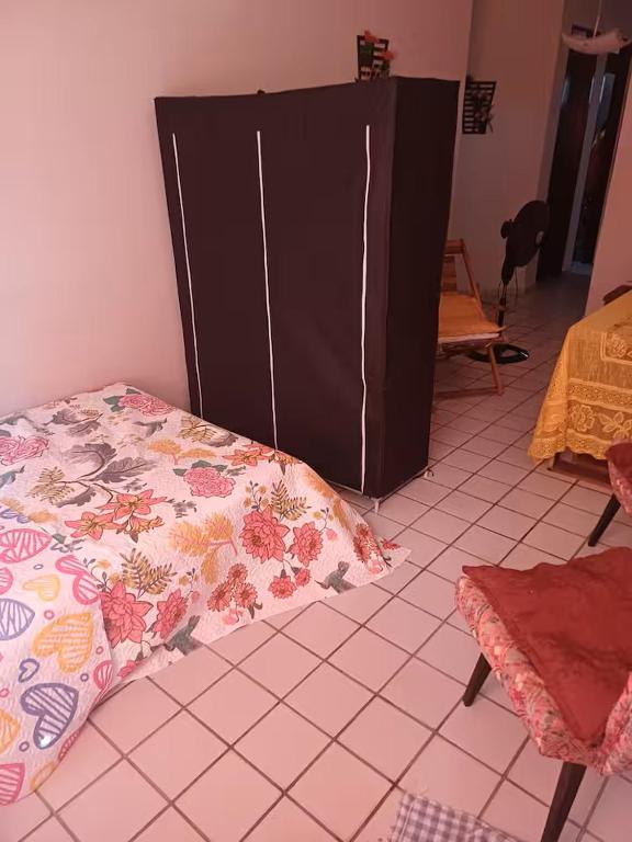 Ένα ή περισσότερα κρεβάτια σε δωμάτιο στο Residencial Aryton Senna