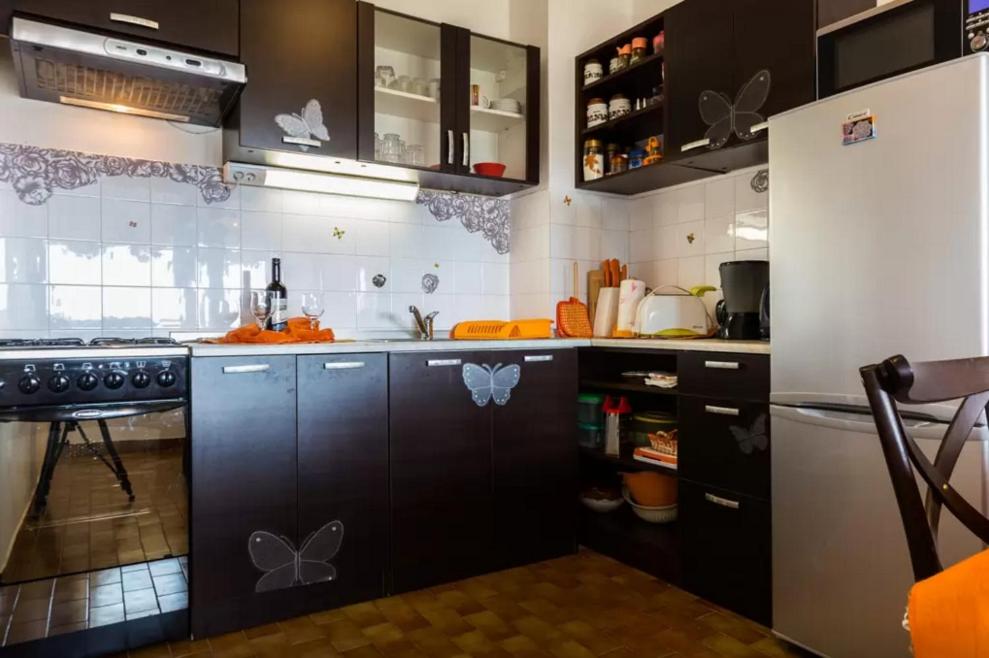 Kuchyňa alebo kuchynka v ubytovaní Apartment Maraska