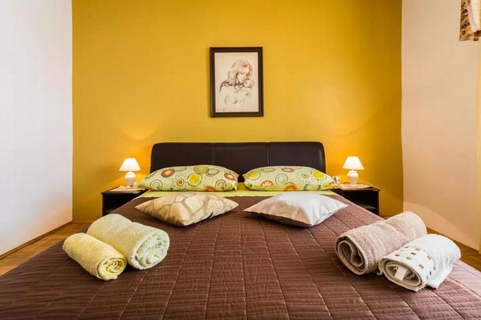 Posteľ alebo postele v izbe v ubytovaní Apartment Maraska