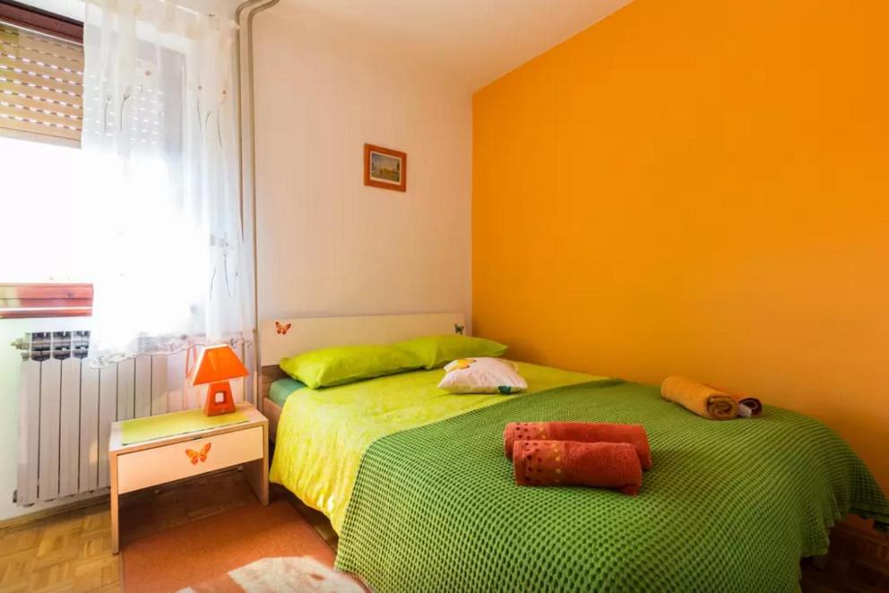Posteľ alebo postele v izbe v ubytovaní Apartment Maraska