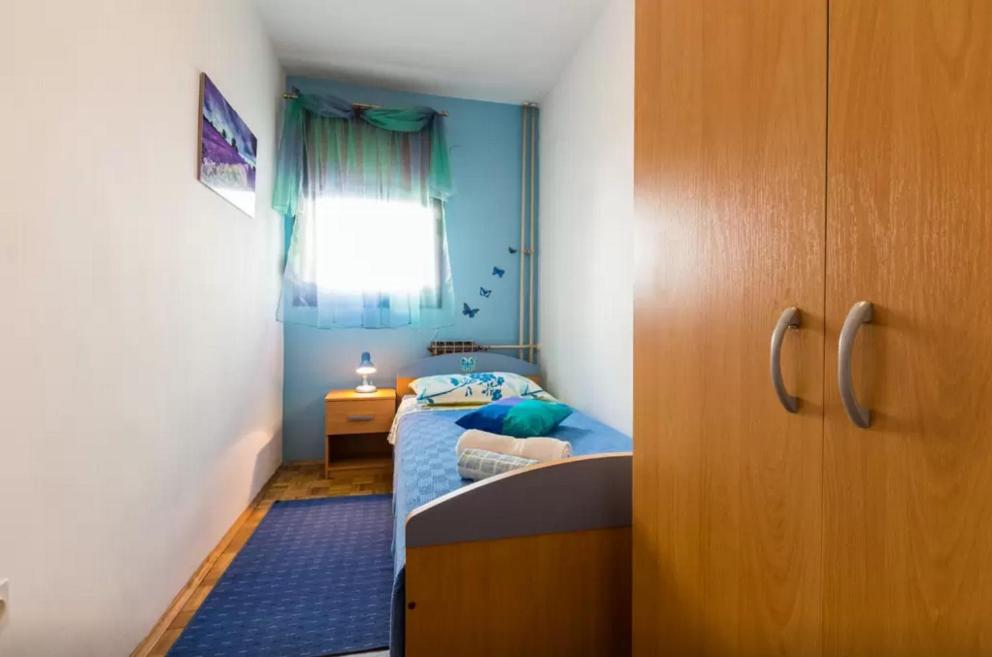 Posteľ alebo postele v izbe v ubytovaní Apartment Maraska