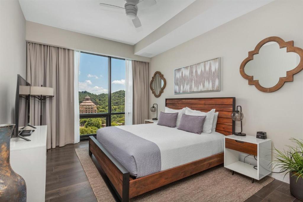 Giường trong phòng chung tại Arras Altitude Adjustment