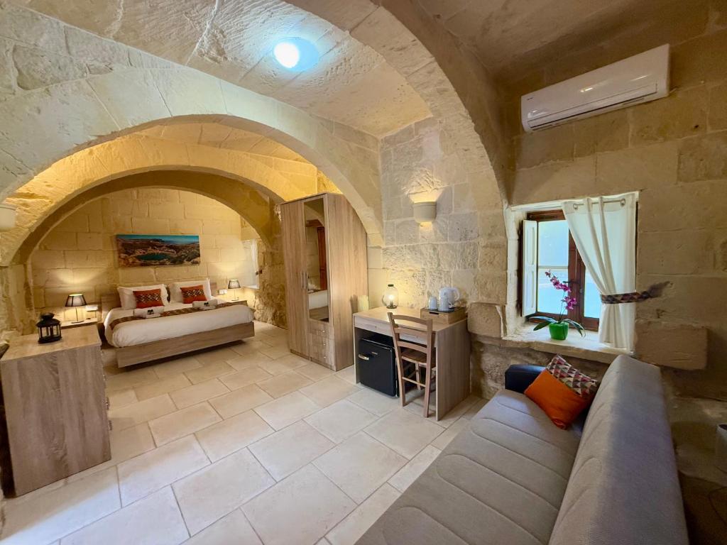 Postel nebo postele na pokoji v ubytování Ta' Matmura B&B