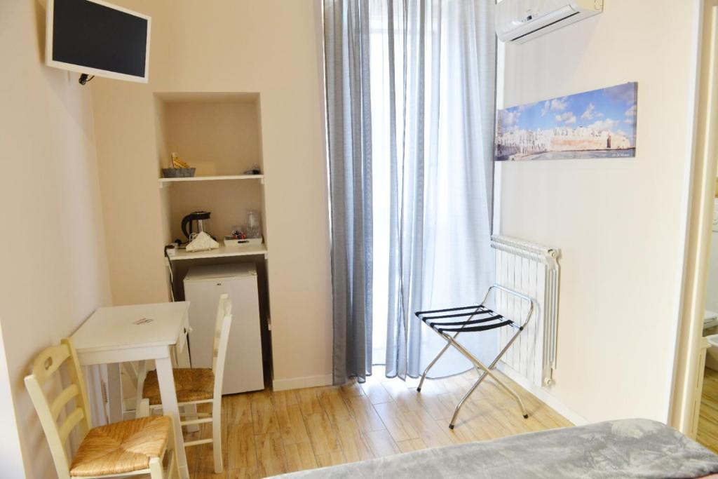 TV a/nebo společenská místnost v ubytování Al Rosa Antico