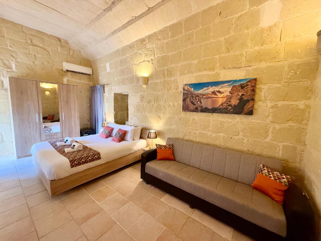 Postel nebo postele na pokoji v ubytování Ta' Matmura B&B