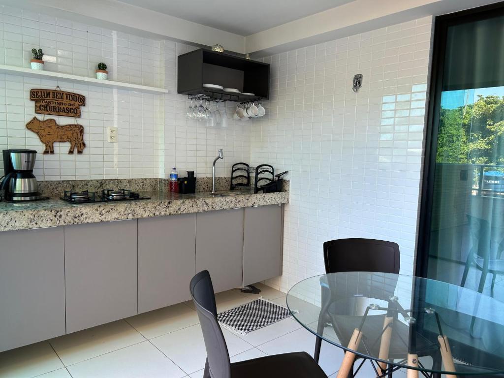 Kuchyň nebo kuchyňský kout v ubytování Tabatinga Flat - Beira Mar