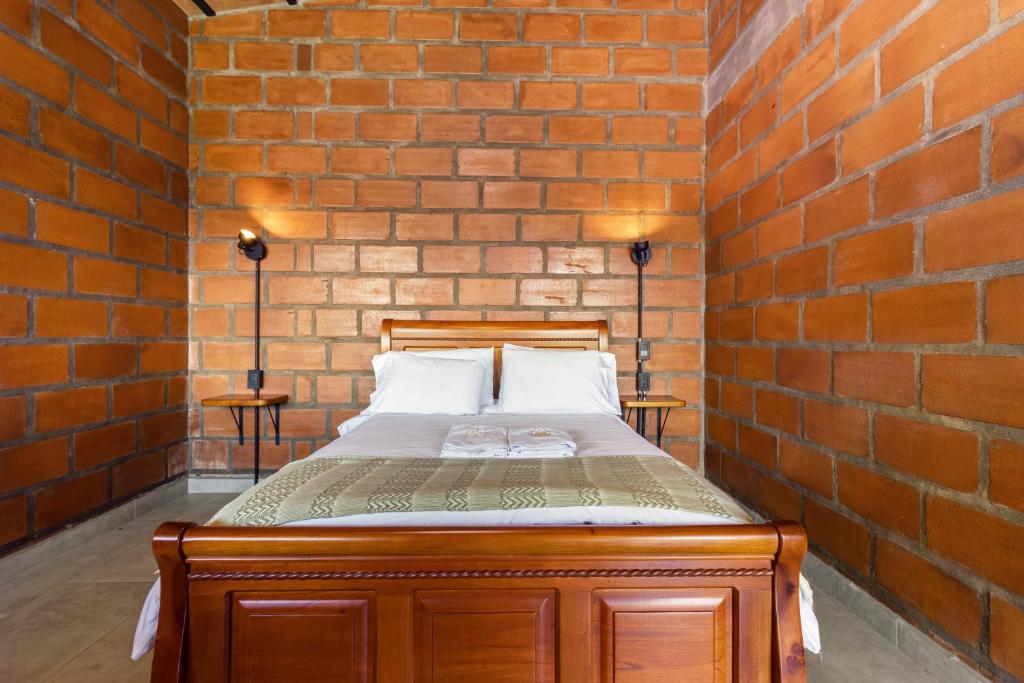 Postel nebo postele na pokoji v ubytování HOTEL EMBRUJO CAMPESTRE