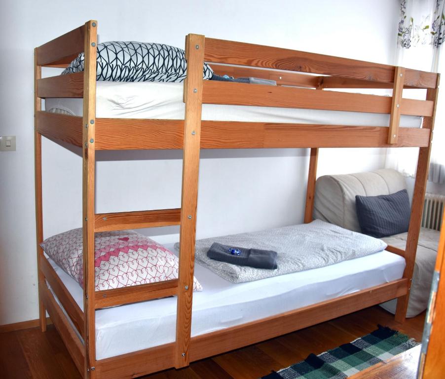 Postel nebo postele na pokoji v ubytování 4 Elements Appartmenthaus Monarda