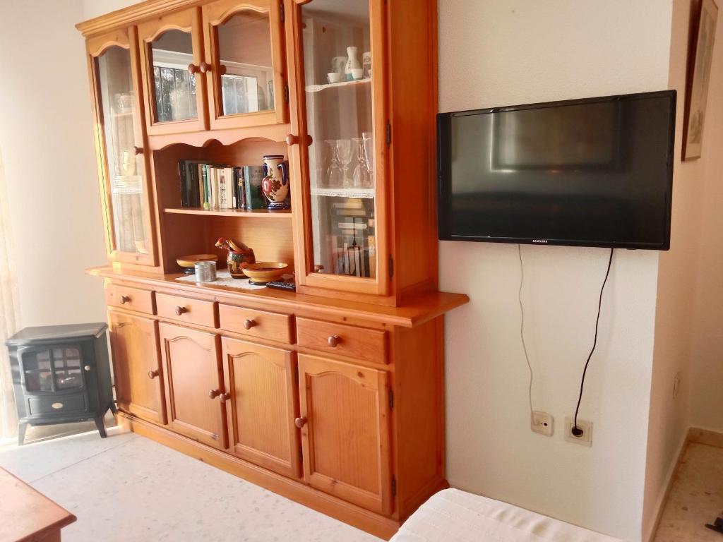 Telewizja i/lub zestaw kina domowego w obiekcie Top Rota Playa La Costilla Costa de la Luz