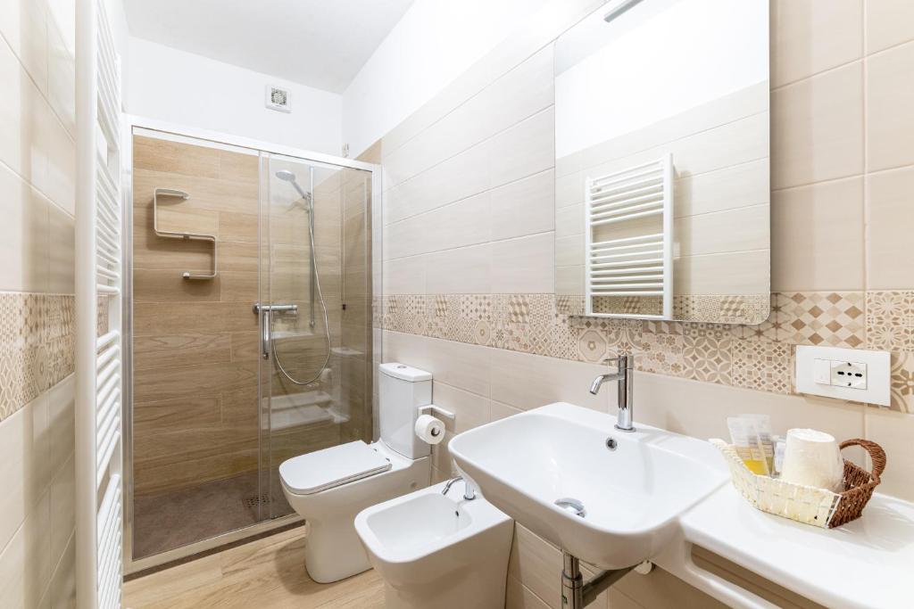 Koupelna v ubytování Albergo Alle Alpi