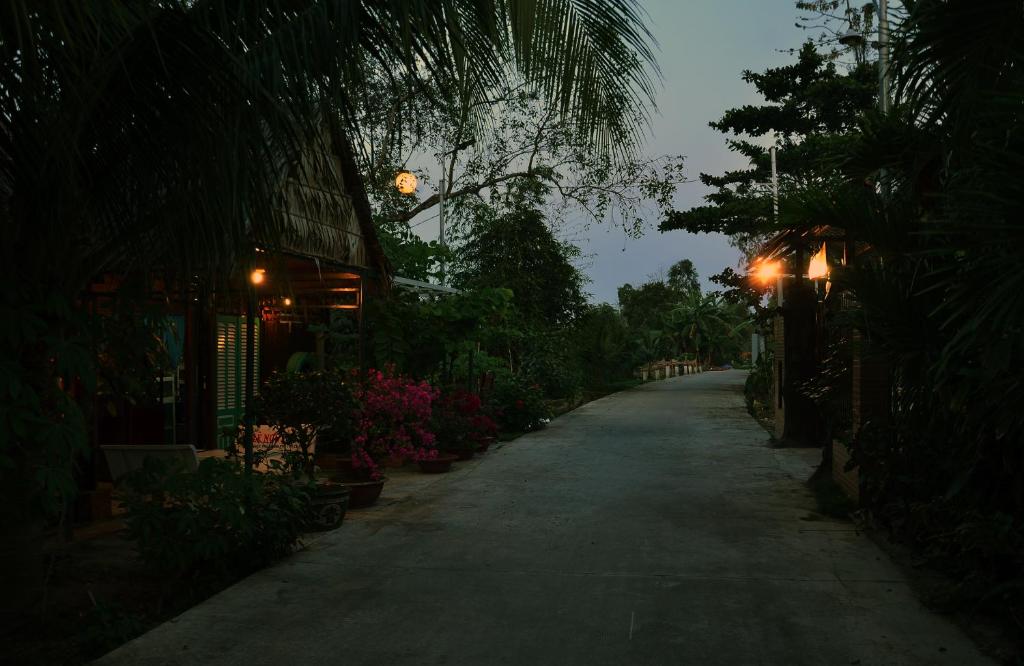 Zahrada ubytování BOSA Homestay - Mekong Riverside