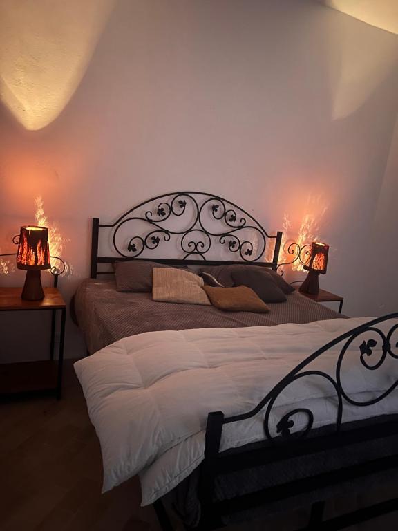 Postel nebo postele na pokoji v ubytování Villa Mariem