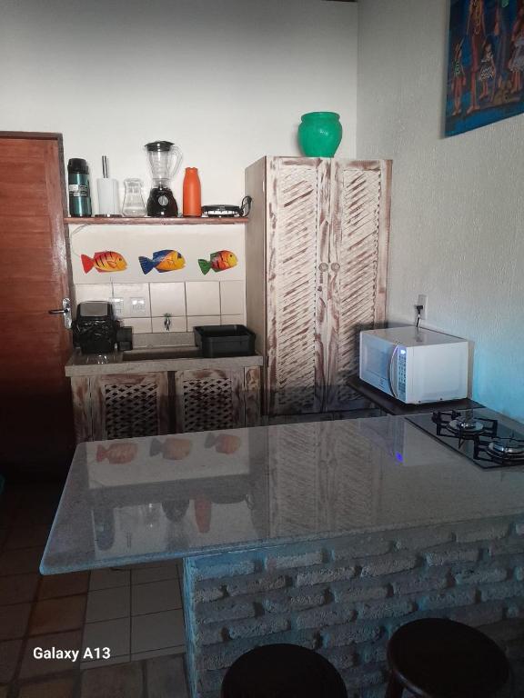 Kuchyň nebo kuchyňský kout v ubytování Fiquei In Pipa - Chalé 19