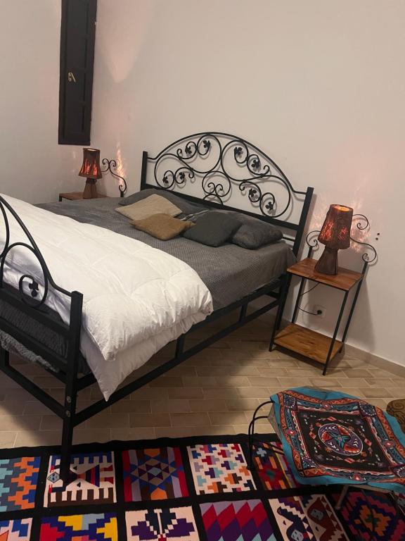 Postel nebo postele na pokoji v ubytování Villa Mariem