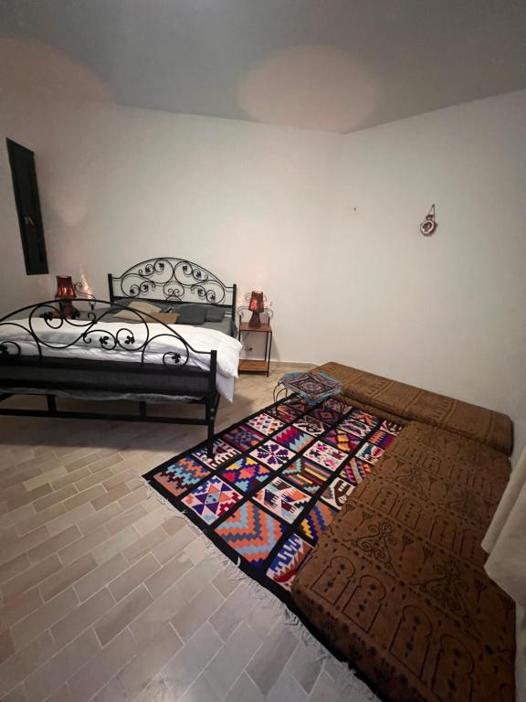 Postel nebo postele na pokoji v ubytování Villa Mariem