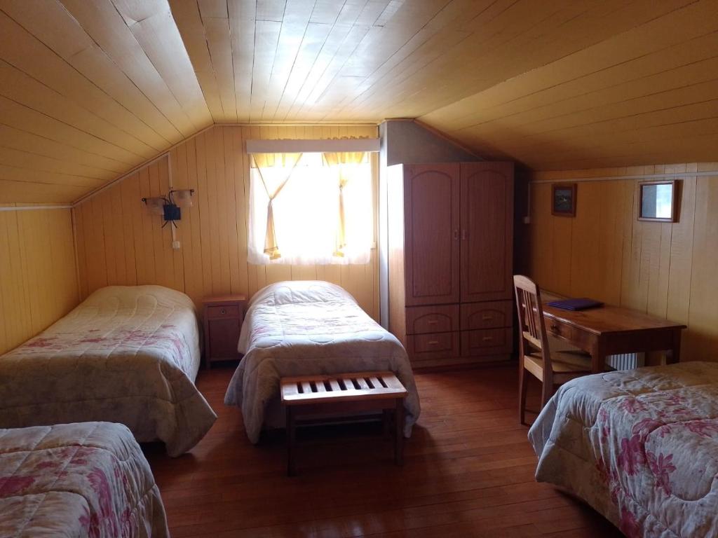 Uma cama ou camas num quarto em La Posada del Colono