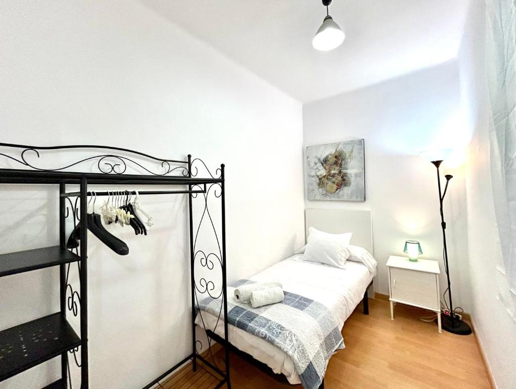 Posteľ alebo postele v izbe v ubytovaní Apartment carrer d'Olesa