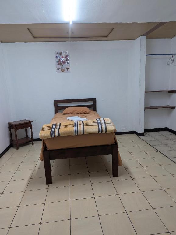 Postel nebo postele na pokoji v ubytování Hotel de conveniencia Travesía urbana
