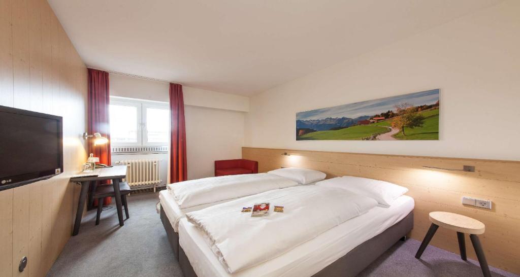 TV a/nebo společenská místnost v ubytování Sure Hotel by Best Western Muenchen Hauptbahnhof