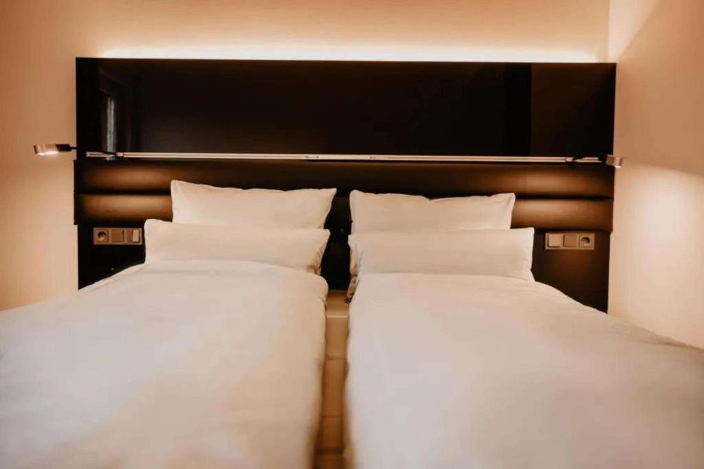Postel nebo postele na pokoji v ubytování Best Western Plus Hotel Brueggen