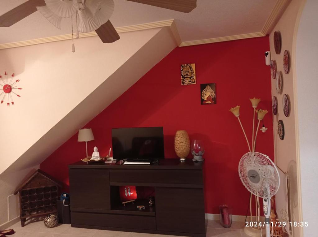 TV a/nebo společenská místnost v ubytování La Casa Roja