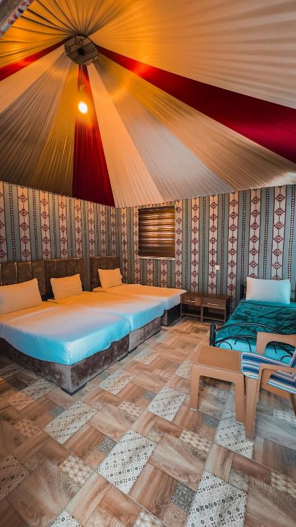 Postel nebo postele na pokoji v ubytování Nada luxury camp