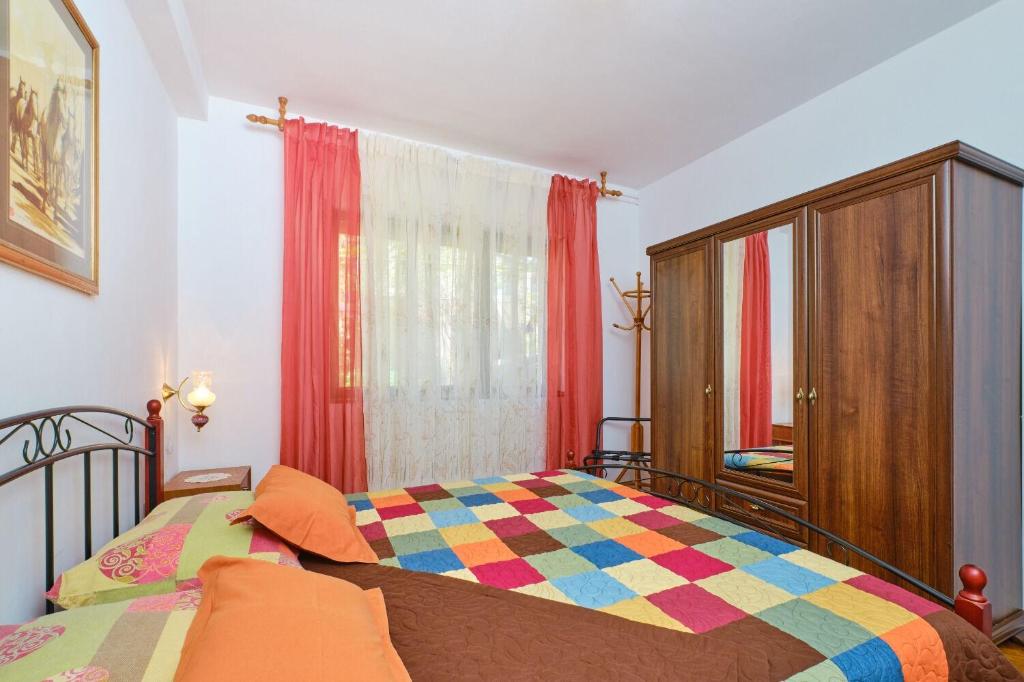 Posteľ alebo postele v izbe v ubytovaní Apartment Giuseppe