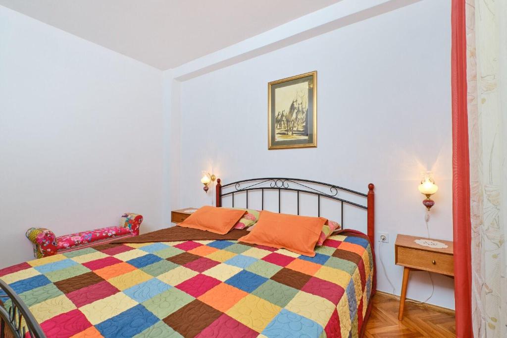 Posteľ alebo postele v izbe v ubytovaní Apartment Giuseppe