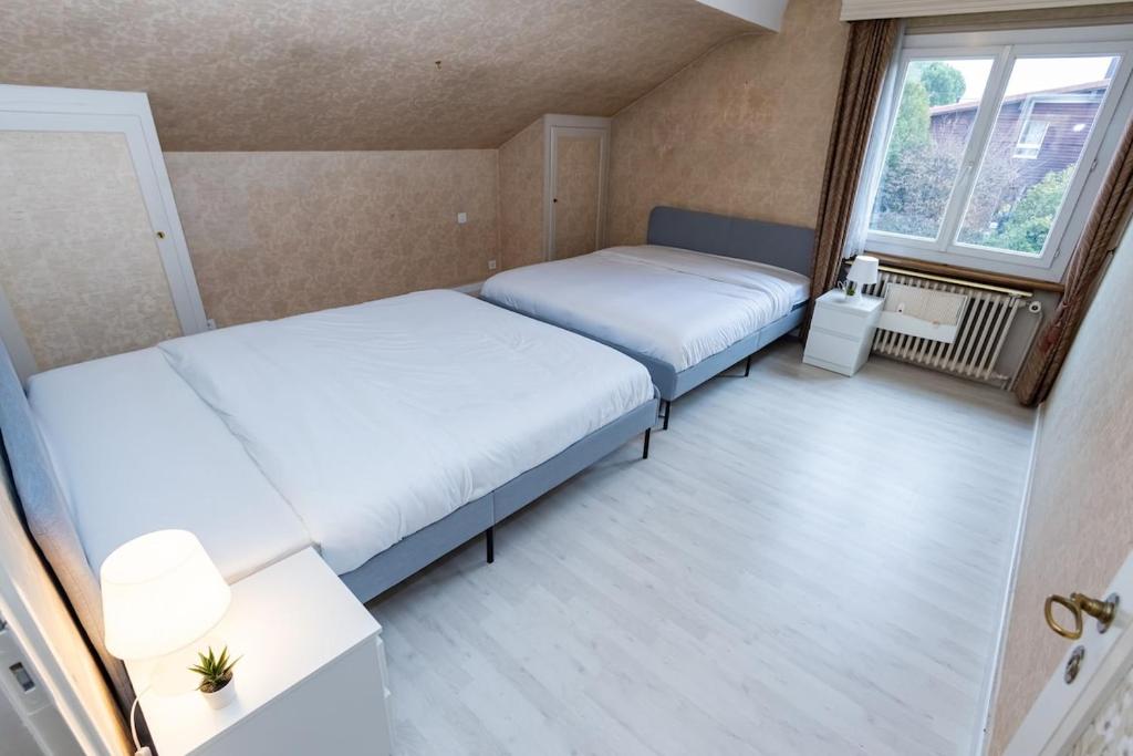 Postel nebo postele na pokoji v ubytování Geneva Villa - 12 persons