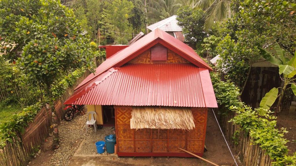 Taman di luar Native amakan house
